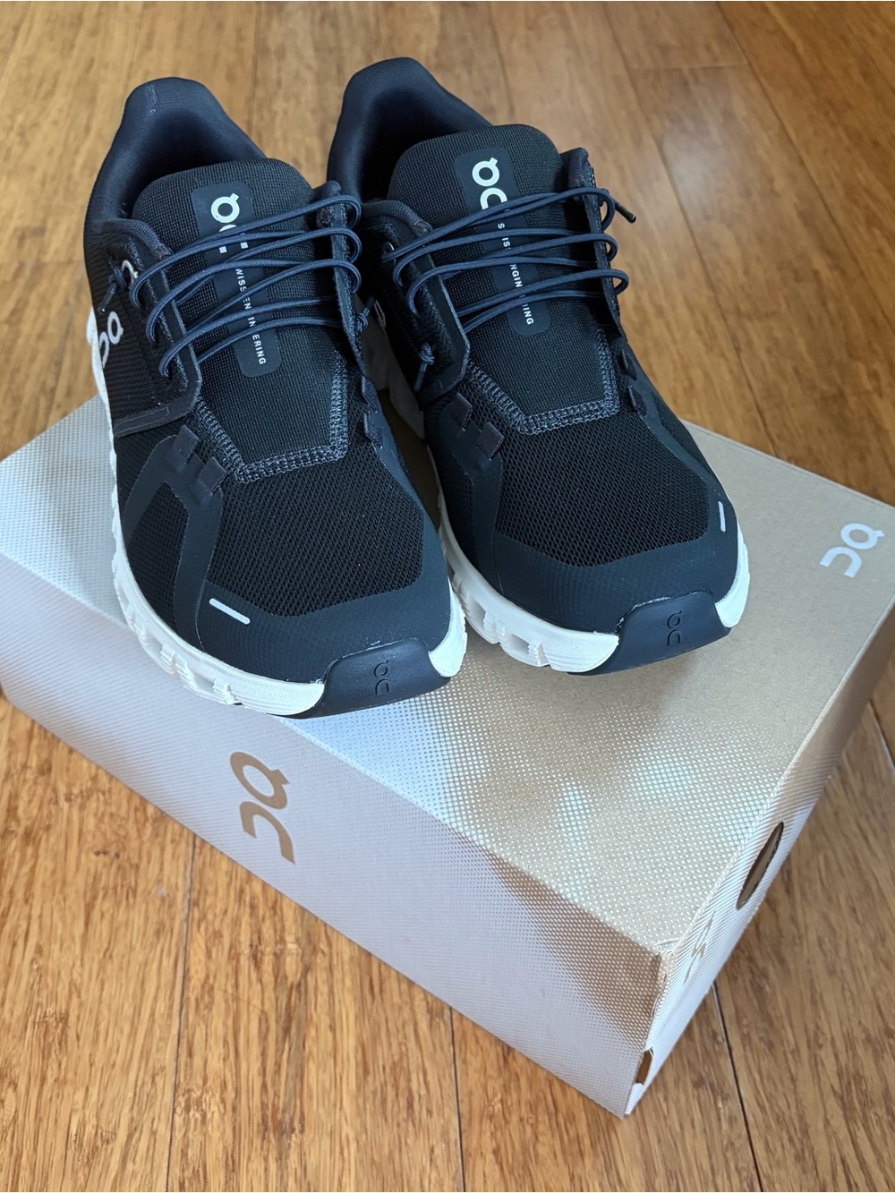 On Clouds Women's Black & White Performance Sneakers